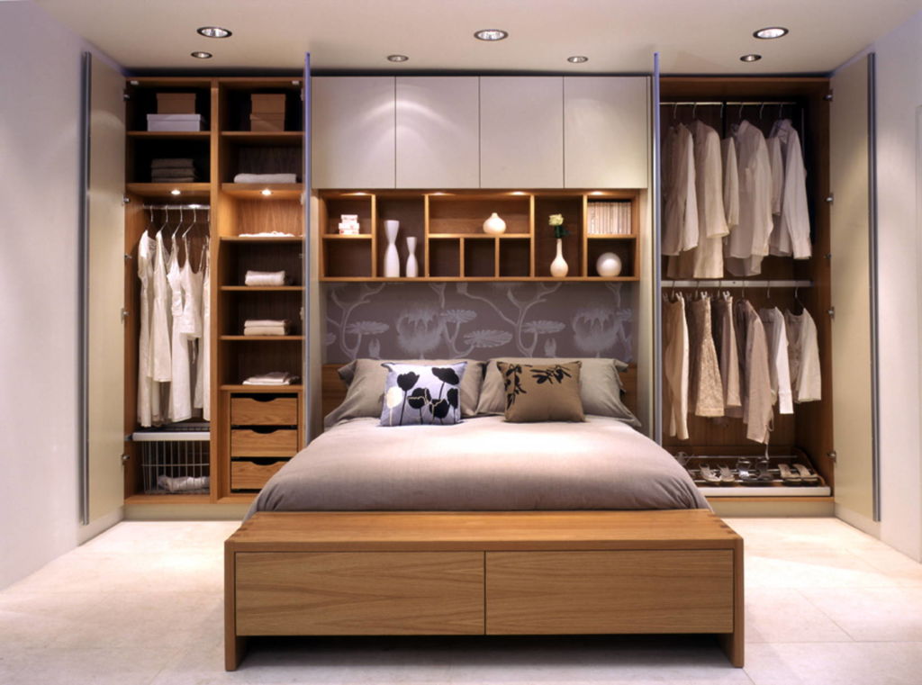 wardrobe over the bed in the bedroom design photo