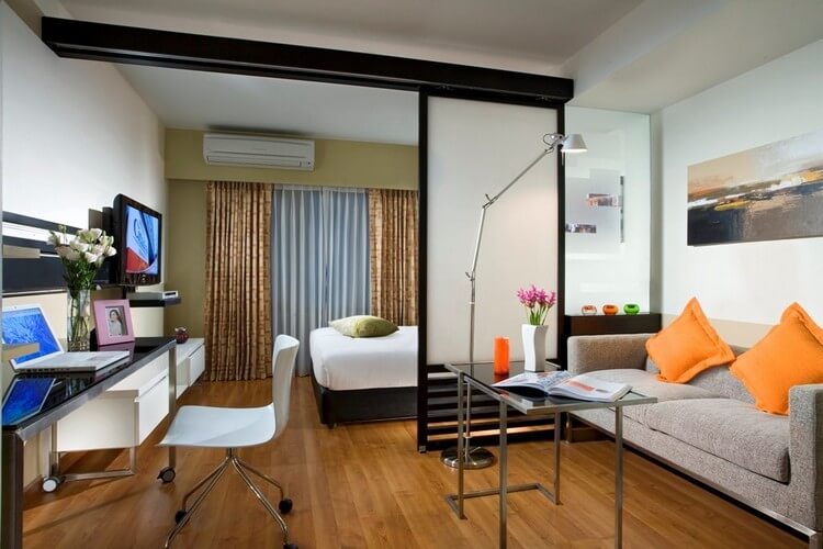 dormitori-saló de 18 m2 disseny fotogràfic