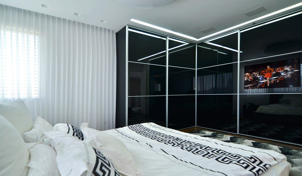 bedroom with corner wardrobe decor