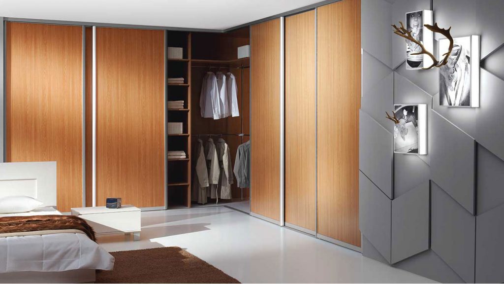 bedroom with corner wardrobe