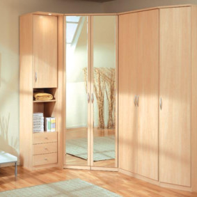 bedroom with corner wardrobe views