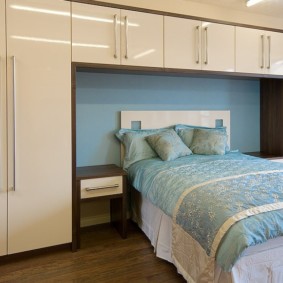 wardrobes over the bed in the bedroom kinds of ideas