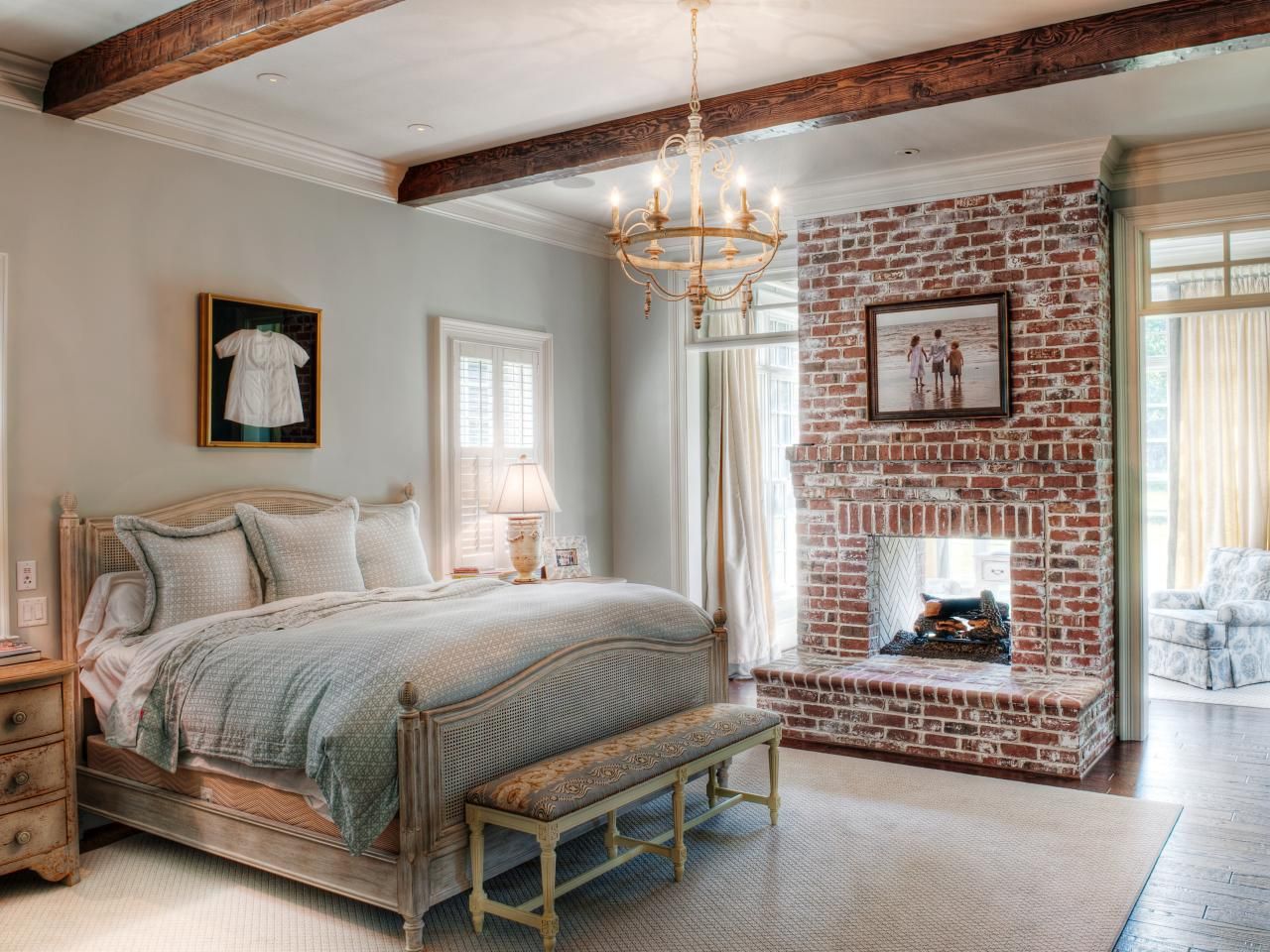 provence bedroom with brick wall