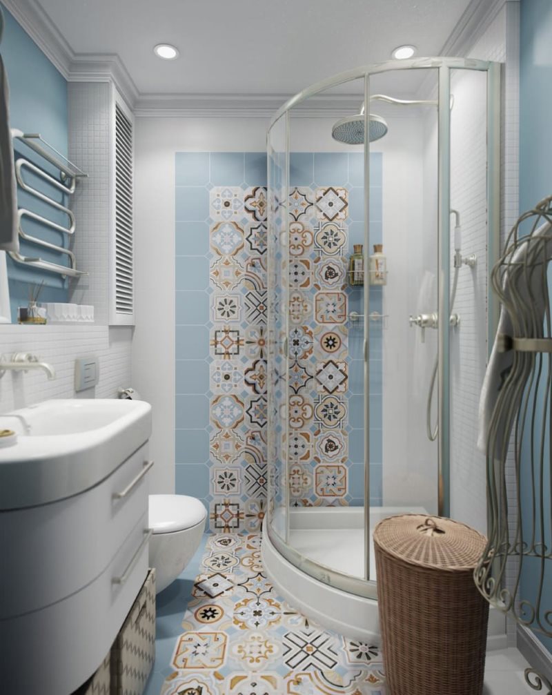 Cabina de ducha angular en un baño moderno.
