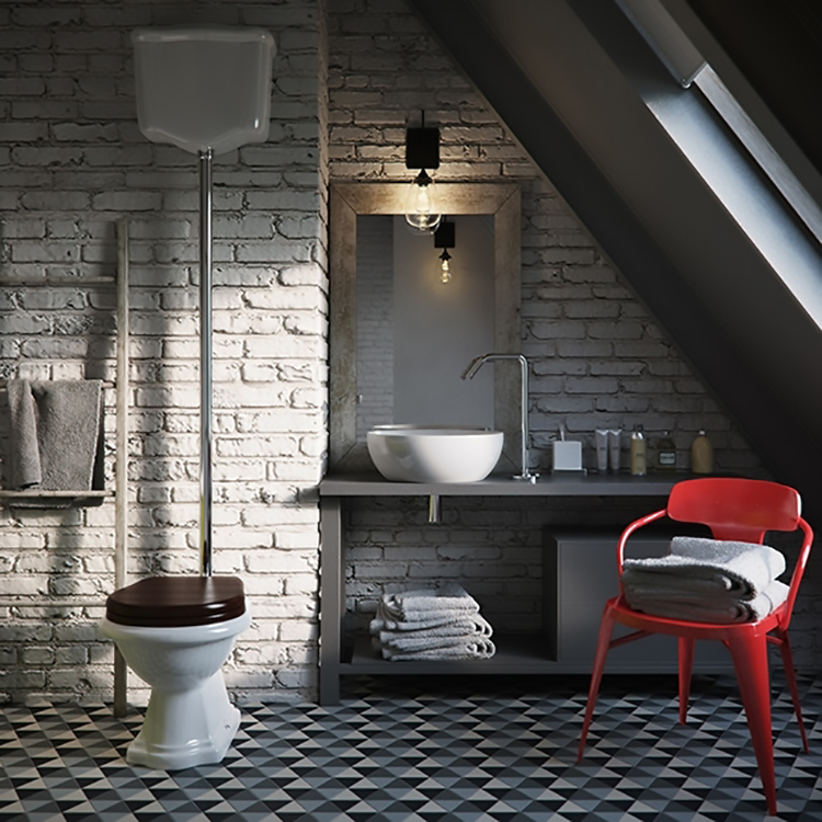Sarkans krēsls pelēkā industriālā stila tualetē