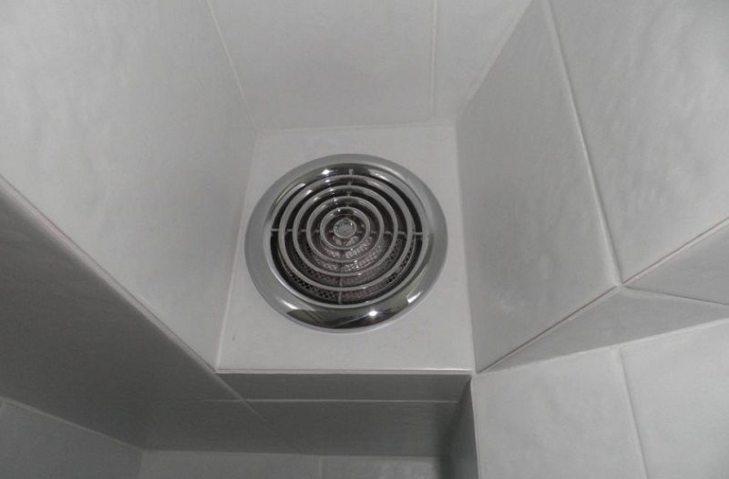 Exhaust fan in the toilet of a wooden house