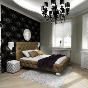 Black chandelier in the bedroom