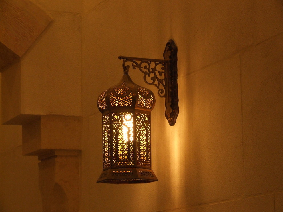Arabic sconce on bedroom wall