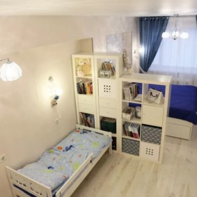bedroom and children's room in one room interior