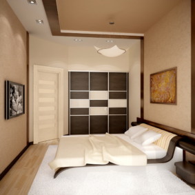 Beige walls of a small bedroom