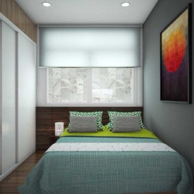 Design of a bedroom with a roller blind