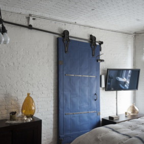 Small bedroom with sliding door