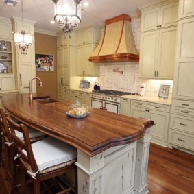 Kitchen island in country style apartment