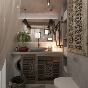 Hidden placement of a washing machine in an oriental-style bathroom