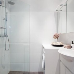 Bright bathroom with white fixtures