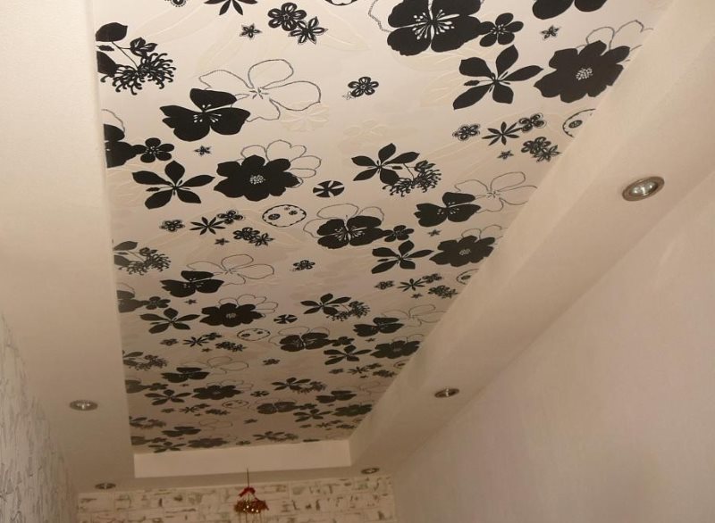 Wallpaper on the ceiling of a narrow hallway