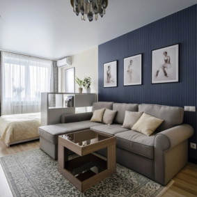 studio apartment with bed and sofa photo decor