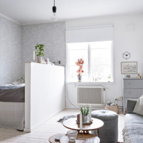one-room apartment with a bed and a sofa photo decor