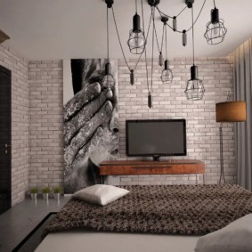 studio apartment sa isang loft style interior na ideya
