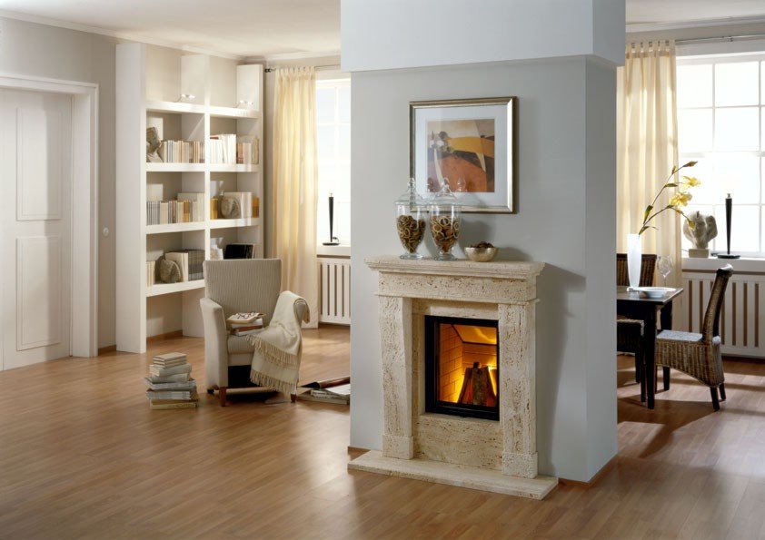 Island fireplace in the living room of a country house