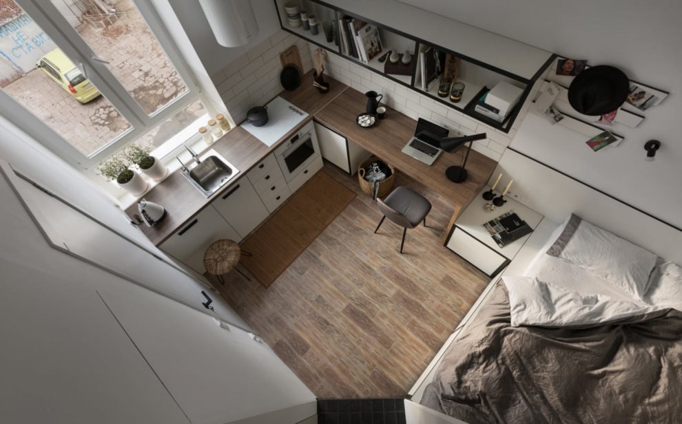 Apartamento de design com cozinha e cama