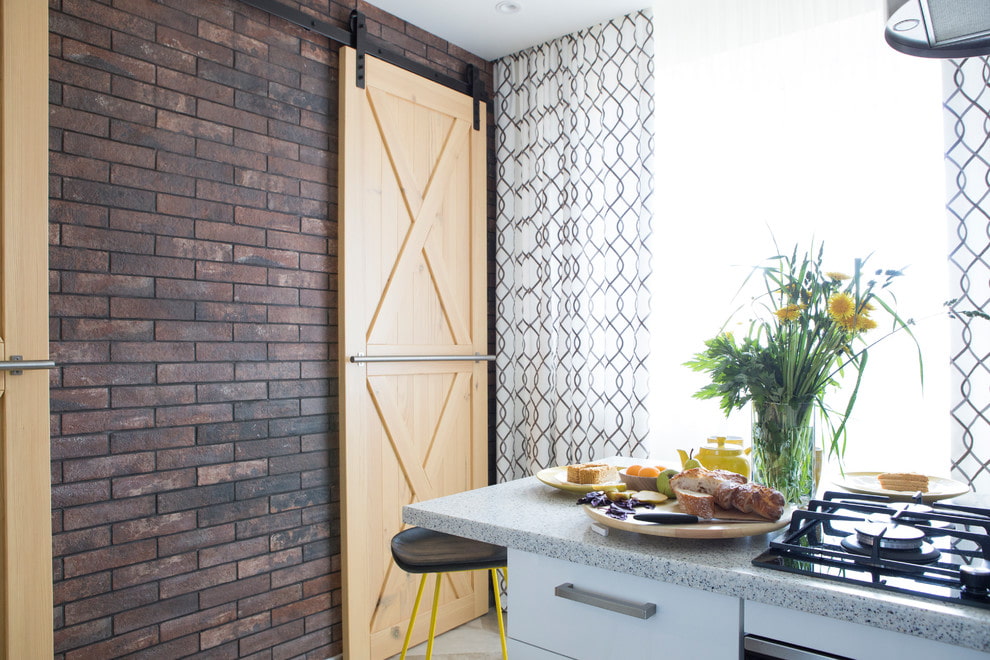 Wooden door in the apartment kitchen