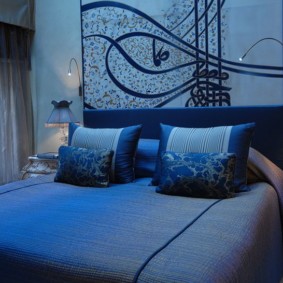 bedroom in blue color photo