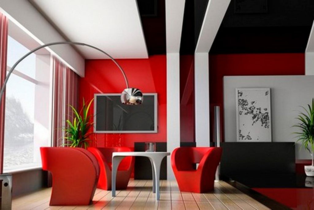 Interiorul roșu-negru al camerei de zi în stilul avangardei