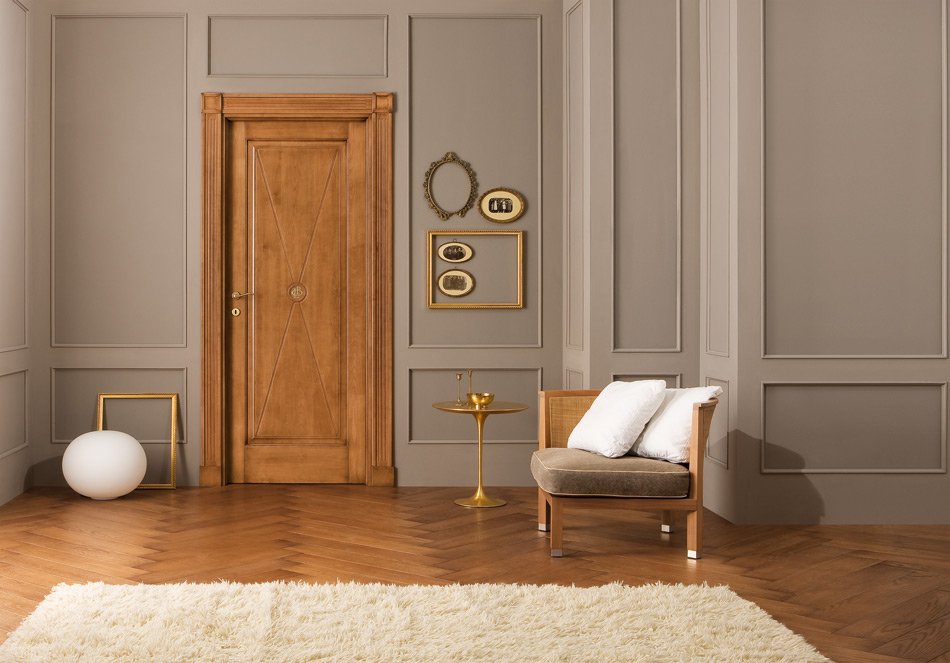 Wooden door in the living room with parquet floor