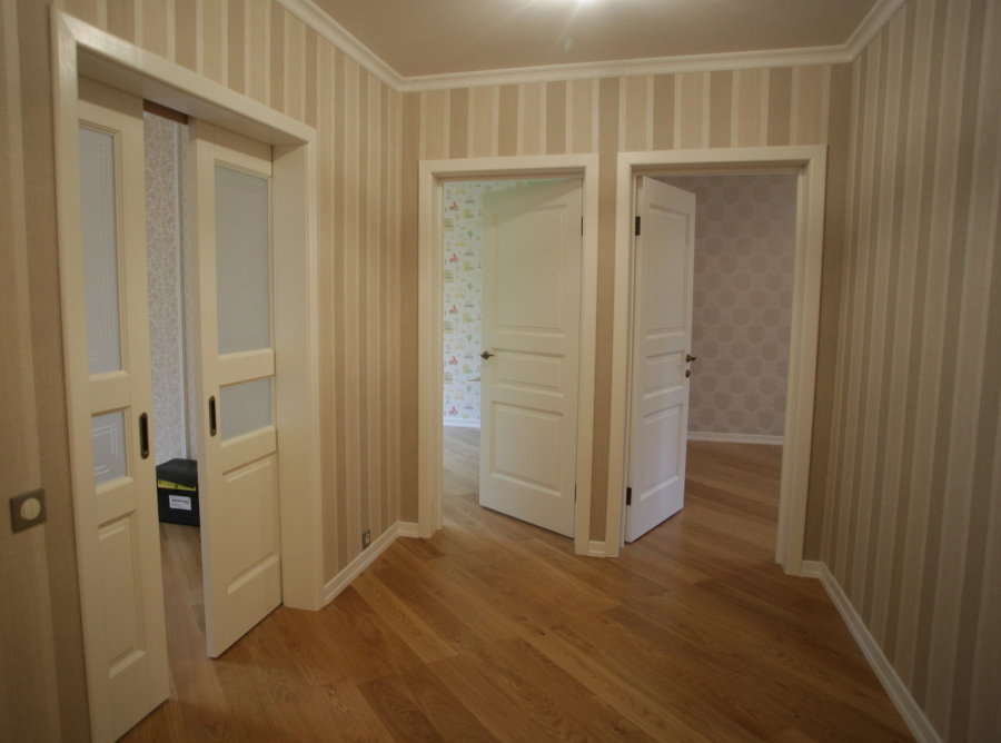 Doors in the entrance hall of a two-bedroom apartment