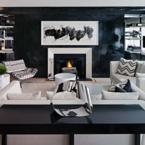 Black and white room with fireplace.