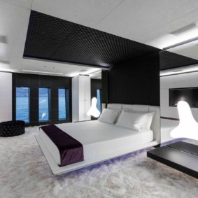 Black ceiling in the bedroom of young people