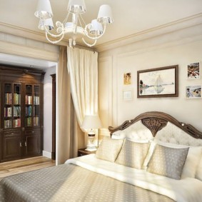 Curtain on a round ledge in a bedroom with an office