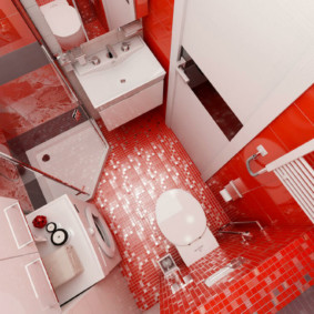Plancher rouge dans la salle de bain combinée