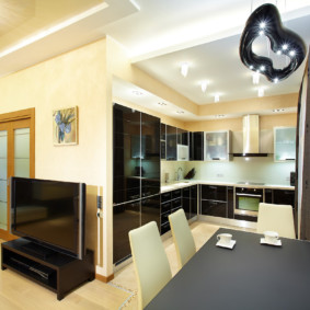 Black facades of kitchen furniture