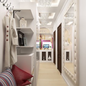 long narrow corridor in the apartment in white