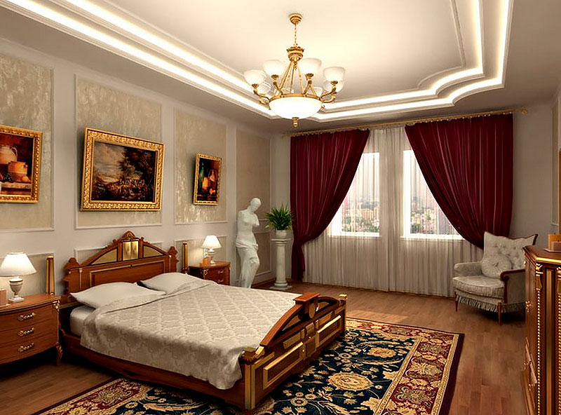 Bild i gyllene ramar i ett sovrum i klassisk stil