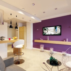 TV panel on the purple wall
