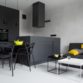 Black furniture in the living room kitchen