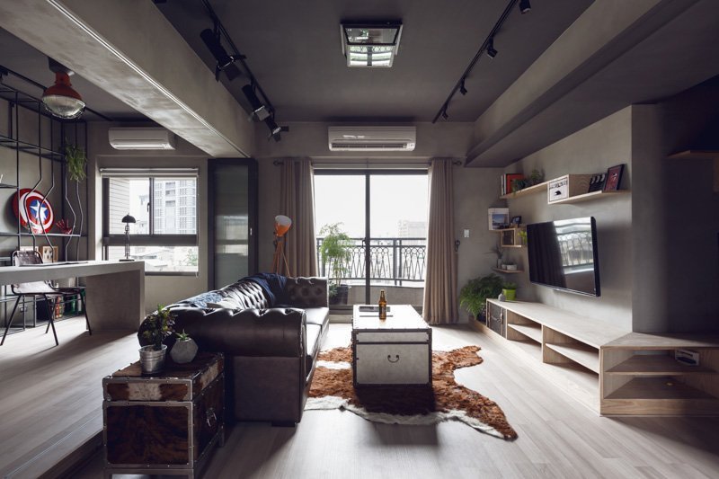 Ang panloob ng apartment para sa isang bachelor sa estilo ng brutalismo