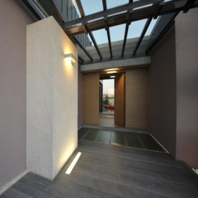 Hallway of a private house with a window in the ceiling