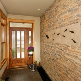wallpaper and decorative stone in the interior of the hallway photo decoration
