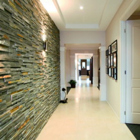 wallpaper and decorative stone in the interior of the hallway