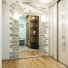 wallpaper and decorative stone in the interior of the hallway photo design