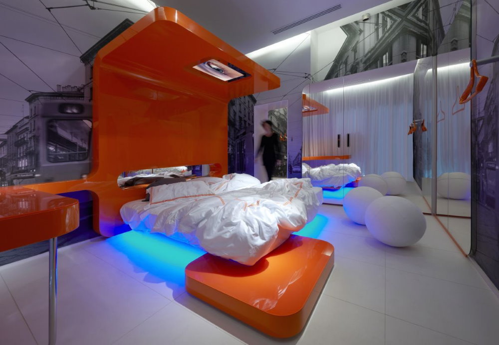 Bright furniture in the interior of the high-tech bedroom
