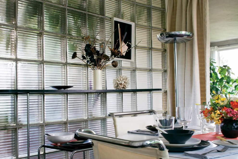 Dining table near the glass block partition