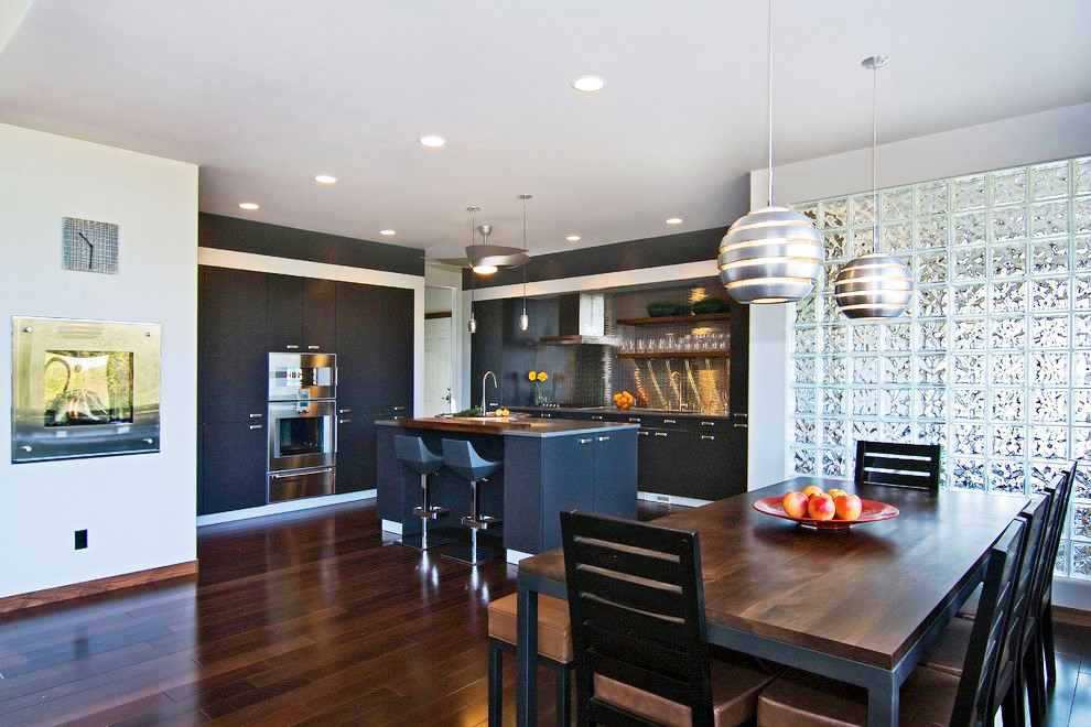 Glass partition in the kitchen-living room of the studio apartment