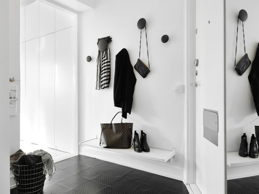 Hanging shelf for bags in the hallway