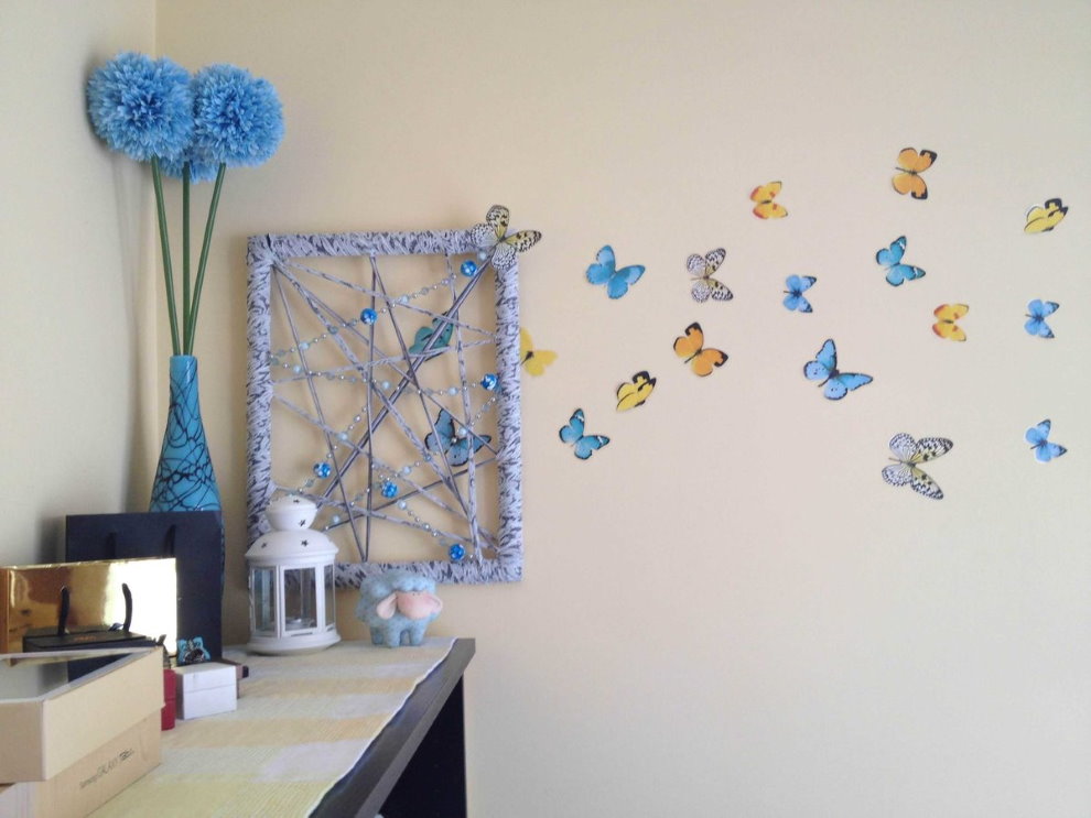Painted butterflies on the wall of a nursery