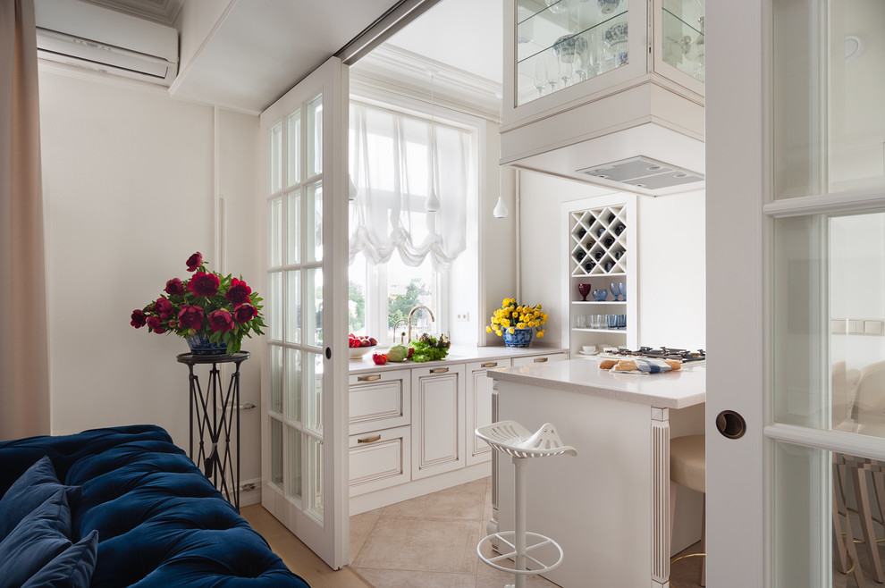 white kitchen with a partition